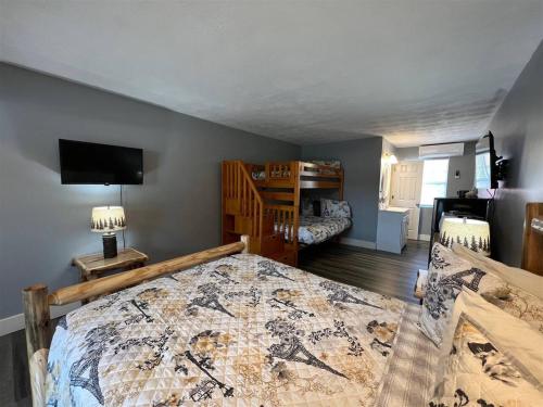 a bedroom with a large bed in a room at Bavarian Brook Unit 4a in Helen