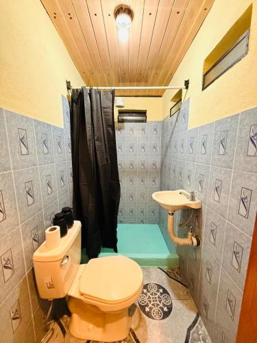 Vonios kambarys apgyvendinimo įstaigoje Casa Amaranto