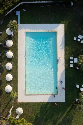 an overhead view of a large pool of water with tents at Villaggio Campeggio Nettuno di Paestum in Paestum