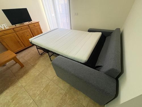 a room with a couch with a mattress on it at Valthi in La Restinga