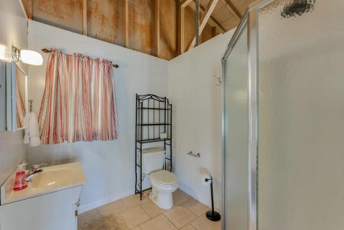 a bathroom with a shower and a toilet and a sink at What A View - Zero Steps To The Dock! Yearround Water in Crane Hill