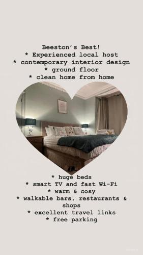 a mirror in a bedroom with a bed in a room at The Rose- Grd Floor, 2-5 Beds, SmartTV, Uni, Tram, M250 Fibre in Nottingham