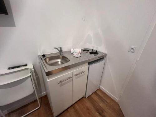 Kuchyň nebo kuchyňský kout v ubytování Studio Sodalite