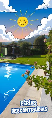 a sign for a swimming pool with a sun and clouds at Casa da Benda in Caniçada