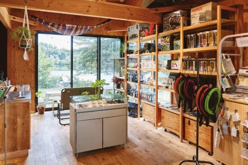 a shop with a counter in a room at Tiny Garden Tateshina in Chino