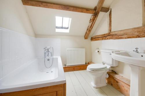 a bathroom with a toilet and a sink at 2 Bed in Erpingham oc-2278 in Erpingham