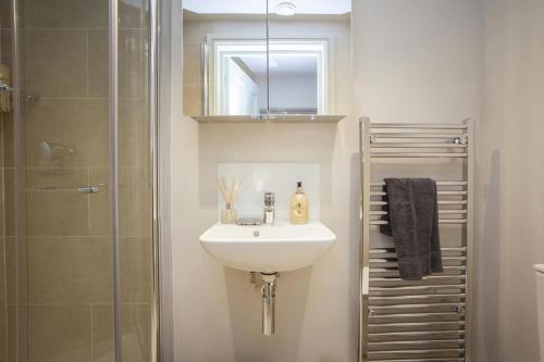 a bathroom with a sink and a shower at 1 Bed in Bath oc-bhr48 in Bath