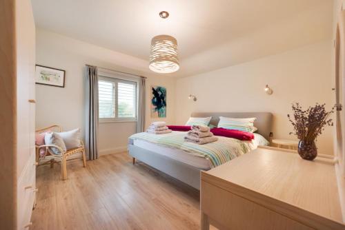 a bedroom with a large bed and a window at 1 Bed in Middleton oc-rosc in Middleton