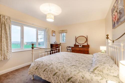 a bedroom with a bed and a window at 2 Bed in Renwick oc-h34195 in Renwick