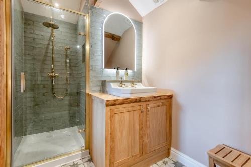 a bathroom with a sink and a shower at 1 Bed in Tollard Royal oc-t29453 in Tollard Royal