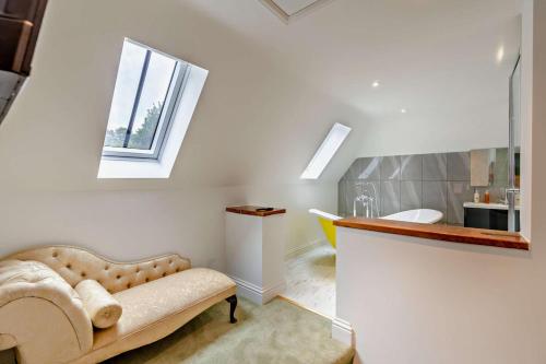 a living room with a couch and a window at 2 Bed in Minster On Sea oc-p29942 in Minster