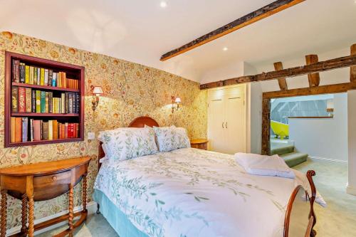 a bedroom with a bed and a book shelf at 2 Bed in Minster On Sea oc-p29942 in Minster