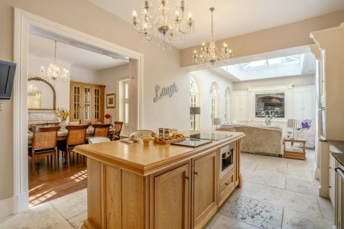 a kitchen and living room with a island in the middle at 4 Bed in Beamish oc-o32025 in Beamish