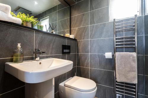 a bathroom with a sink and a toilet at 1 Bed in Tunstall oc-p30379 in Tunstall