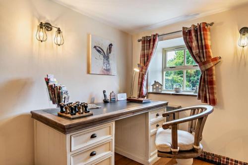 a home office with a desk and a window at 2 Bed in Bolam oc-b29967 in Ingleton