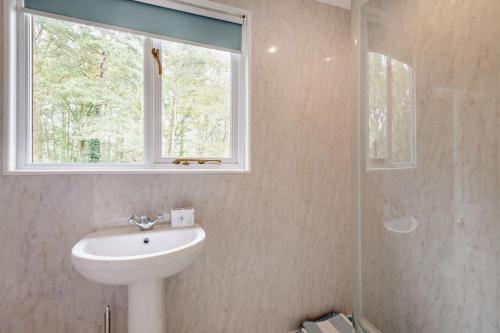 a bathroom with a sink and a window at 2 Bed in Eccles oc-l27507 in Eccles