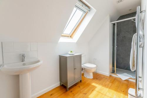 a bathroom with a sink toilet and a shower at 3 Bed in Coverack oc-b31082 in Coverack