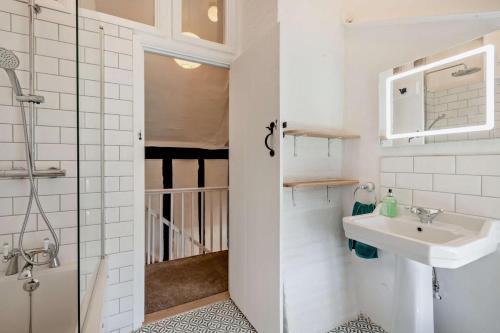 a bathroom with a sink and a shower at 2 Bed in Ilketshall St. Margaret oc-w27520 in Rumburgh
