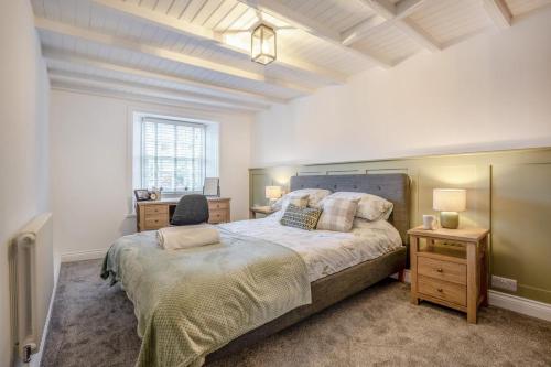 a bedroom with a bed and a chair in it at 3 Bed in Pickering oc-t33630 in Pickering