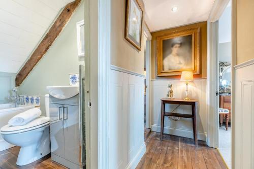 a bathroom with a toilet and a sink at 4 Bed in Alnmouth oc-a30221 in Alnmouth