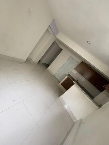 an overhead view of an empty room with white ceilings at Bohio rd in Santo Domingo