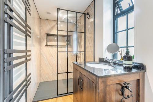 a bathroom with a sink and a shower at 1 Bed in Whitbourne oc-s32935 in Whitbourne