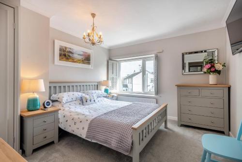 a bedroom with a bed and a window at 2 Bed in Braithwaite oc-p31730 in Braithwaite