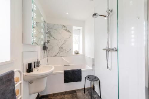 a white bathroom with a sink and a shower at 2 Bed in Battle oc-c31781 in Battle