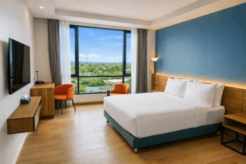 מיטה או מיטות בחדר ב-Levo Hotel