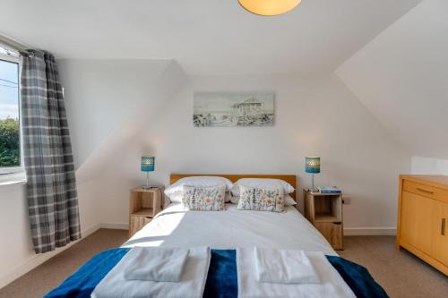 a bedroom with a bed and a window at 3 Bed in Coldingham oc-b29846 in Coldingham