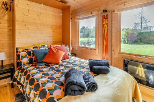 a bedroom with a bed with towels on it at 1 Bed in Cilycwm oc-t29297 in Cilycwm