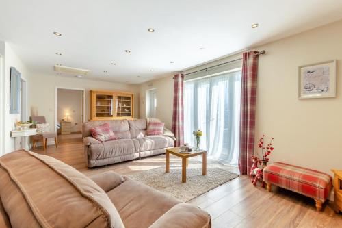 a living room with a couch and a table at 1 Bed in Wombleton oc-m31864 in Nunnington