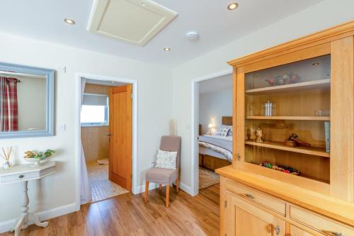 a room with a bedroom with a bed and a desk at 1 Bed in Wombleton oc-m31864 in Nunnington