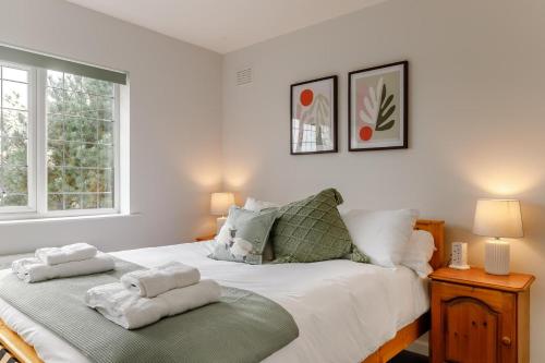 a bedroom with a bed with two towels on it at 3 Bed in Ashbourne oc-e27970 in Ashbourne