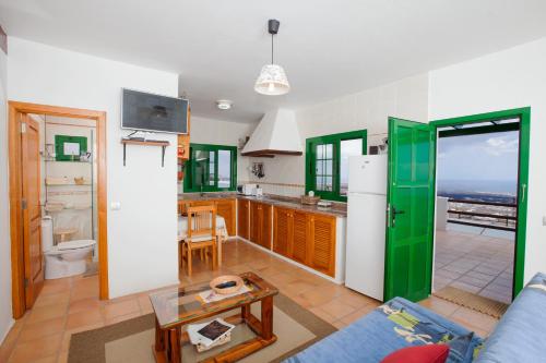Kuchyň nebo kuchyňský kout v ubytování Casa Tinasoria