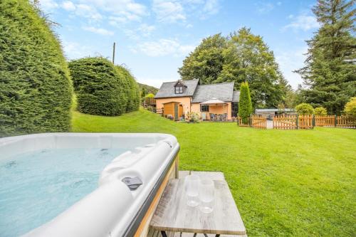 a bath tub in the backyard of a house at 2 Bed in Devils Bridge oc-d29575 in Devils Bridge