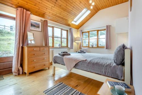 a bedroom with a bed and a wooden ceiling at 5 Bed in Devils Bridge oc-t13712 in Devils Bridge