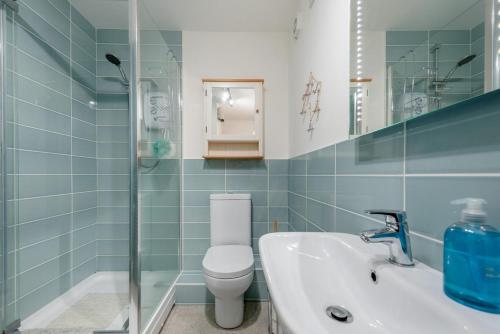 a bathroom with a toilet and a sink at 3 Bed in Broad Haven oc-t30529 in Broad Haven