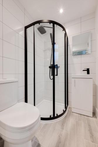 a bathroom with a shower and a toilet at 3 Bed in Looe oc-l30071 in Looe