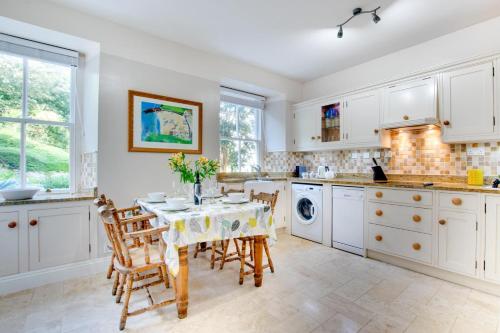 a kitchen with a table and chairs and a sink at 2 Bed in St. Levan oc-p00851 in Saint Levan