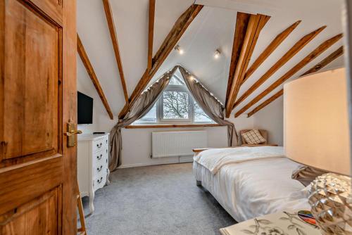a bedroom with a bed and a window at 2 Bed in Port Talbot oc-b30705 in Port Talbot