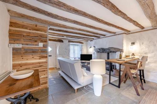 a home office with a desk and a table at 1 Bed in Harlech oc-t32043 in Harlech