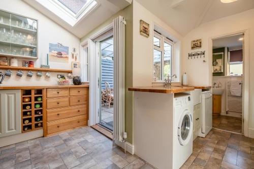 a laundry room with a washer and dryer at 2 Bed in Wimborne oc-s30924 in Wimborne Minster