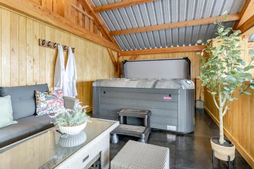 a living room with a couch and a bed in a trailer at 5 Bed in Cyffylliog oc-c32596 in Cyffylliog