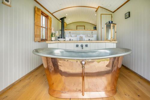 a large tub in a room with a kitchen at 1 Bed in Bronllys oc-t31950 in Bronllys