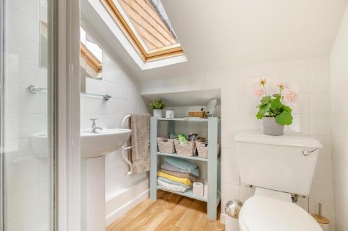 a bathroom with a toilet and a sink at 2 Bed in Bodham oc-s29720 in Bodham