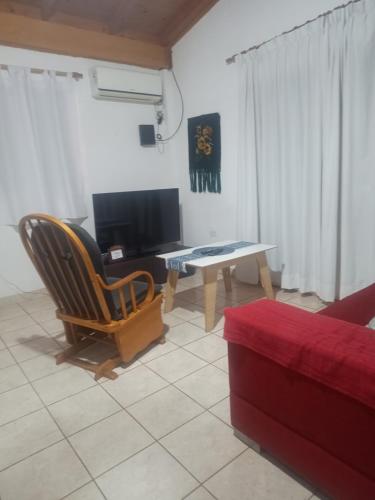 a living room with a couch and a table at El Portal in Posadas