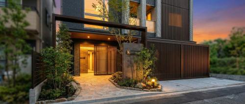 an external view of a house with a courtyard at GRACE STAY Hiroshima Peace Memorial Park in Hiroshima