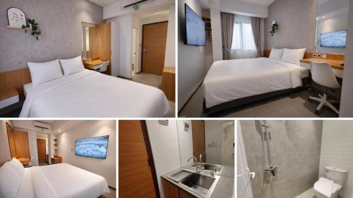 a hotel room with two beds and a bathroom at The Orchid by FLAT06 in Jakarta