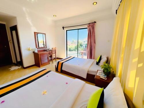 Katil atau katil-katil dalam bilik di VPlus Siem Reap